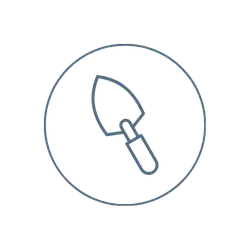 A simple line drawing of a trowel inside a circle, representing a gardening or construction tool.